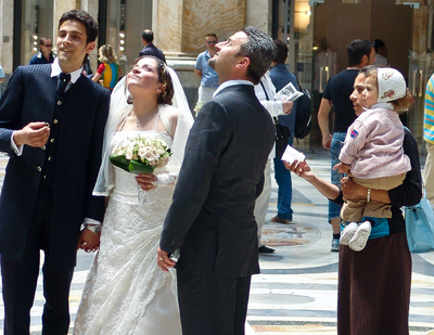 The Story Behind This Photo - Naples, Italy Wedding - Woman Asking for Change While the Couple Was Getting Married